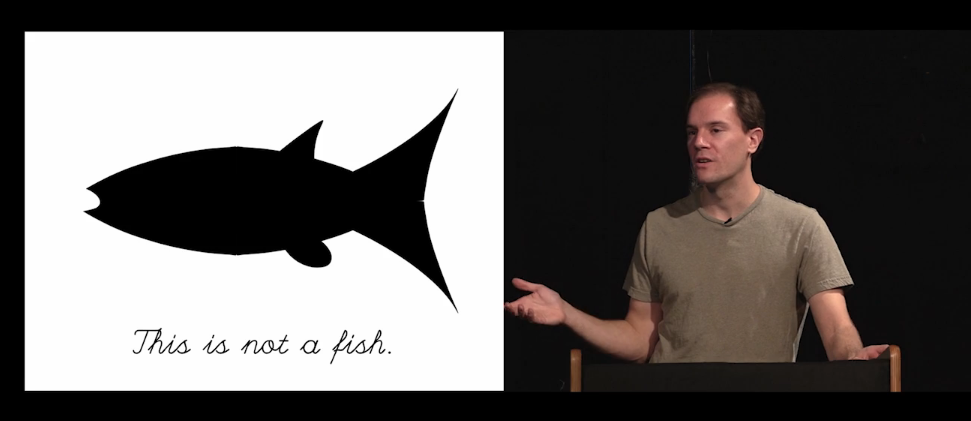 Bret Victor on the right with a black and white cartoon fish on the left. Under the fish is the statement - This is not a fish.