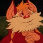 The character Snarf from Thundercats rubbing its hands.